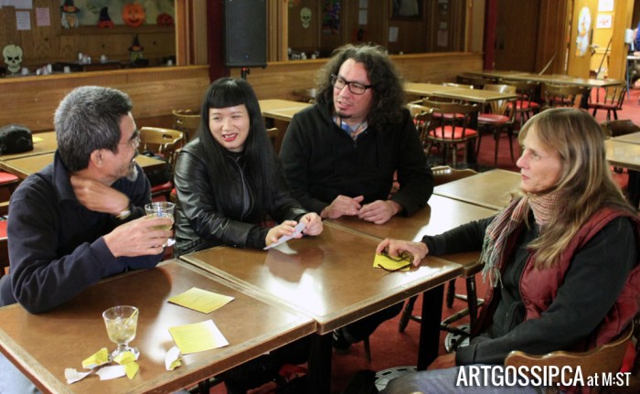 Festival artists watching setup